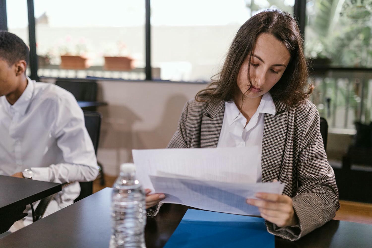 woman looking at documents